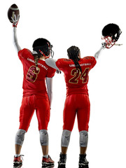 Wall Mural - two women teenager girls american football players  isolated on white background silhouette with shadows