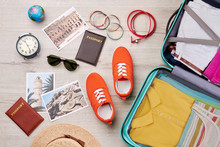 Different Travelling Accessories, Packed Suitcase. Summer Holiday Background.