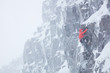 © Paul Bride - Climber soloing in winter blizzard