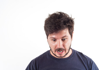 30 years old man with fear or shock on face and looking down