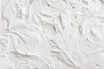 Wall Mural - White decorative abstract plaster texture with waves and surf.