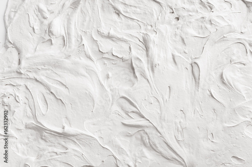 Fotografía White decorative abstract plaster texture with waves and surf.