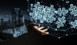© sdecoret - Businessman holding hand-drawn puzzle pieces