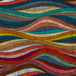 © flovie - Seamless embroidered pattern. Wavy bohemian print. Patchwork ornament.