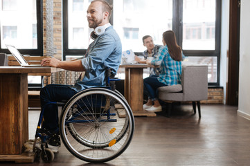 Intelligent handicapped student studying in a public place