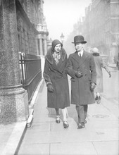 Couple With Flu Masks. Date: 1929