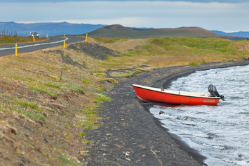 Wall Mural - Iceland Landscape with a Red Boat