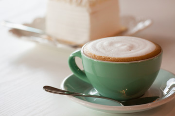 Wall Mural - Coffee and Cake on White Table