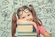 © Myst - beautiful cute little genius girl with books. Math formulas, problems around her
