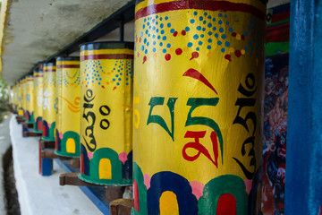 Buddhist wheels with mantras. Sacred Letters and Drawings