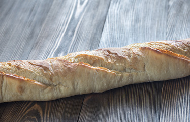 Sticker - Baguette on the wooden background