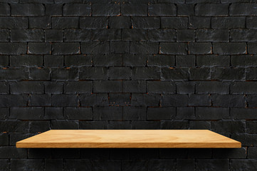 Aufkleber - Empty wood board shelf at black brick wall background,Mock up for display or montage of product or design