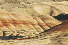The Painted Hills, Landscape With Red Layers Running Through The Slopes In The John Day Fossil Beds National Monument In Oregon. 