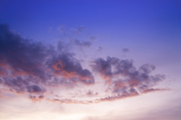 Wall Mural - sunset / sun rise sky with rays of yellow and red light shining clouds and sky background and textur