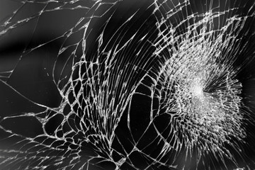 Broken glass on mobile phone, macro photo