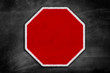 © rohane - blank stop sign on a black chalkboard