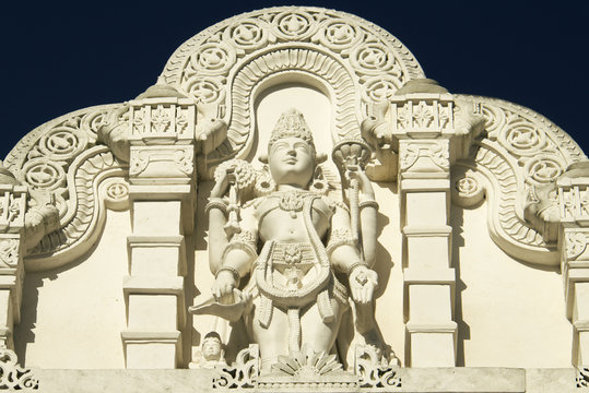 A Hindu god Shiva displayed on the wall of a Hindu temples.