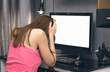© Dmitriy - The girl working on computer with blank screen monitor and holding her hands on the head. Lack of time concept, tiredness, failure or headache concept.