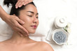 © waewkid - Woman lying and preparation face or head massage in spa