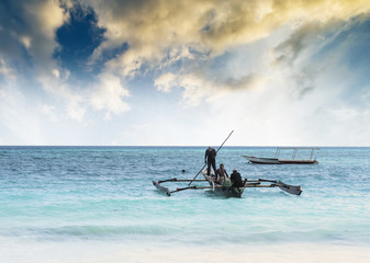 Wall Mural - beautiful colorful seascape with fishing boats and fishermen, Zanzibar