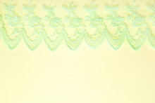 Green Lace On Yellow Background