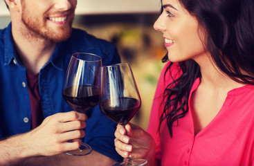 Canvas Print - happy couple dining and drink wine at restaurant