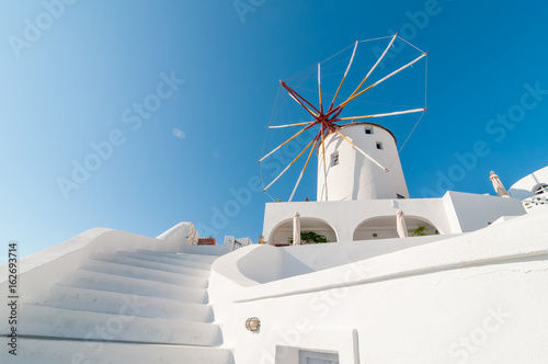 Fotografia Windmill at Oia, Santorini, Greece.