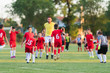 © Dusan Kostic - Kids soccer football - children players exercising before match on soccer field