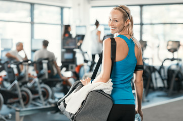 woman with gym bag