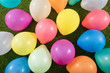 Leinwandbild Motiv Colorful Balloons on the grass