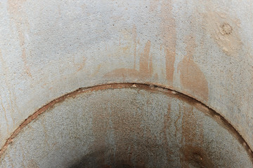 Well for water extraction. The construction of a village well for the extraction of water with the help of several concrete rings laid in a pit of earth