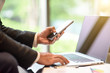 © surasak - Business man work with phone and labtop