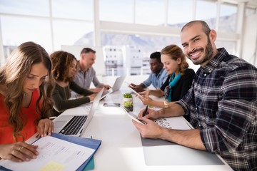 Sticker - Attentive executives in a meeting