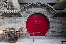 A Wooden Cart In Front Of A Round Door Way At The South Gate Of The Xian City Wall In Shaanxi Province China.