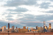 Chicago Skyline at dusk, with an interesting, beautiful, cloudy sky behind.