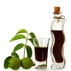 Wall Mural - Walnut liqueur isolated on white background