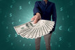 © ra2 studio - Businessman holding money
