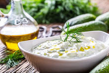 Tzatziki. Traditional Greek Dip Sauce Or Dressing Tzatziki Prepared  With Grated Cucumber Sour Cream Yogurt Olive Oil And Fresh Dill. Mediterranean Cuisine.