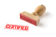 A rubber stamp on a white background - Certified