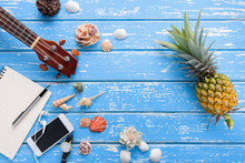 Summer Holiday Travel Concept On Wooden Table Background