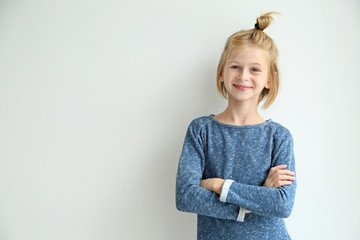 funny teenager girl with freckles on white background