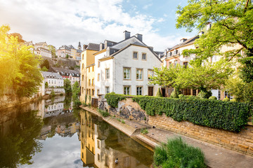 Sunset view on the old buildings near the river in Grund district of the old town of Luxembourg city