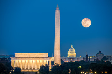 Wall Mural - Supermoon above three iconic monuments: Lincoln Memorial, Washington Monument and Capitol Building in Washington DC as viewed from Arlington, Virginia