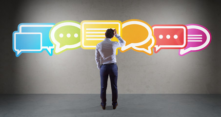 Wall Mural - businessman using social network interface on a wall 3d rendering