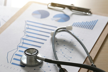 Poster - financial report chart and calculator medical report and stethoscope