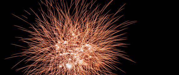 Wall Mural - Orange Fireworks Blue Background