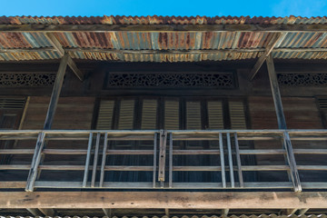 Poster - The antique old wooden balcony in Thailand.