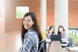 © ChayTee - Portrait young asian female college student on campus. Student, College student, Teenager ,Education concept.
