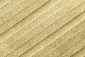 Beige pleated fabric closeup