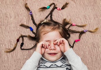 Poster - Close-up portrait of little child girl with hair braids